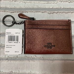 Coach metallic dark blush mini wallet